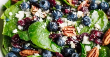 Blueberry Spinach Salad with Honey Balsamic Dressing on a plate
