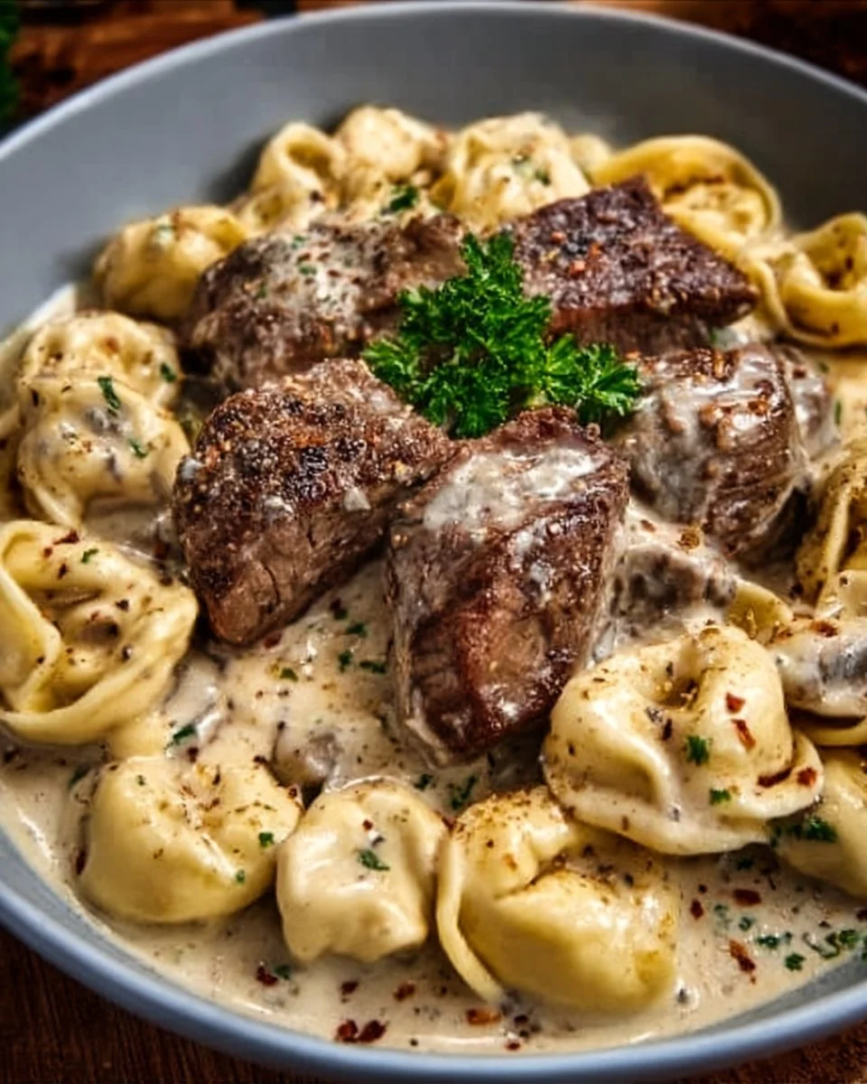 Creamy Cracked Garlic Steak Tortellini served in a rich sauce