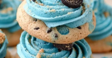 Crumbl's mouthwatering Blue Monster Cookies with chocolate chips and colorful candies.