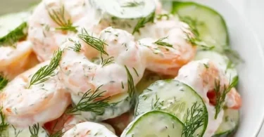 Cucumber Shrimp Salad with fresh vegetables and shrimp served in a bowl