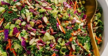 Colorful detox salad with fresh vegetables and herbs for a healthy meal.