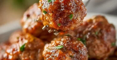 A plate of delicious homemade meatballs with marinara sauce
