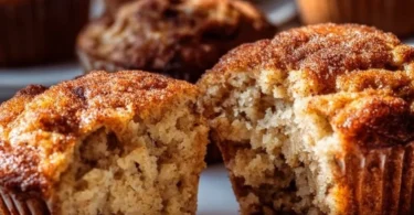 Fluffy banana cinnamon muffins with Greek yogurt on a plate