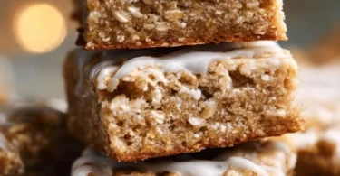 Delicious iced oatmeal cookie bars topped with creamy icing