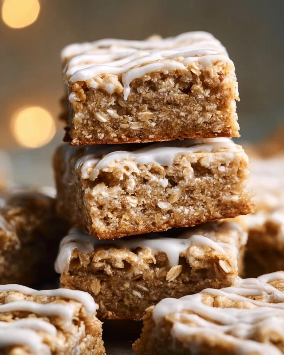 Delicious iced oatmeal cookie bars topped with creamy icing