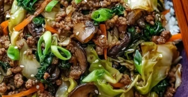 Savory Chinese ground beef and cabbage stir fry on a plate